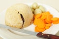 Steak and kidney pudding ready to serve Royalty Free Stock Photo