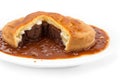 Steak and kidney pudding on white background Royalty Free Stock Photo