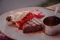 Steak & Lobster with garlic dish on white plate Royalty Free Stock Photo