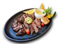 Steak with medium rare in plate with garlic lemon pumpkin side dish and sauce on white background die cut with clipping path