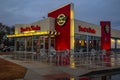 Steak n Shake outdoor dining tables in the rain and building Royalty Free Stock Photo