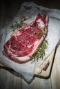 Steak over a wooden background