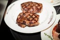 Juicy Steak served by chef Royalty Free Stock Photo