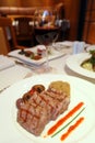 Steak plate with mushrooms and bulgur wheat and red wine Royalty Free Stock Photo