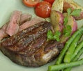 Steak with Potatoes, Tomatoes, and Asparagus