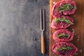 Steak. Raw beef steak. Fresh raw Sirloin beef steak sliced o Herb - Rosemary decoration