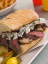 Steak and Roquefort Sandwich with Fries Gherkins