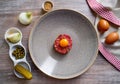 Steak Tartare raw meat recipe with egg yolk