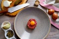 Steak Tartare raw meat recipe with egg yolk