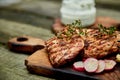 Steak turkey grill on wooden cutting board