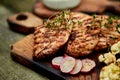 Steak turkey grill on wooden cutting board