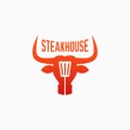 Steakhouse logo with bull . Steak bbq and grill Royalty Free Stock Photo