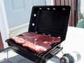 Steaks on a barbaque