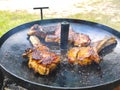 Steaks are fried in their own juice on pan Royalty Free Stock Photo