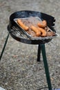 Steaks and sausages on grill