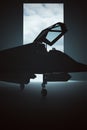 Stealth Bomber Jet Aircraft in a Dark Hanger Royalty Free Stock Photo