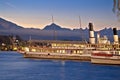 Steam boat on Swiss lake Luzern morning fog view Royalty Free Stock Photo