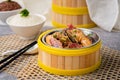 STEAM CHICKEN With CHINESE SAUSAGE with chopsticks served in dish isolated on table top view of singapore food Royalty Free Stock Photo