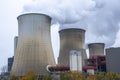 Steam clouds rising from cooling towers of power station. Royalty Free Stock Photo