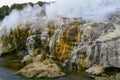 Steam and colorful rocks at Te Puia hot springs, Rotorua, New Zealand