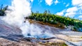 The Hot and Crystal Clear Blue Water in the Beryl Spring Geyser in Yellowstone National Park in Wyoming, USA Royalty Free Stock Photo