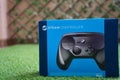 Steam Controller by Valve with its original box in calm early cold morning