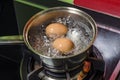 Steam, eggs and boiling water.