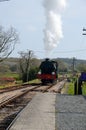 Steam engine on a railway track Royalty Free Stock Photo