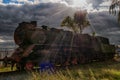 Steam engine on the railways on sun rays Royalty Free Stock Photo