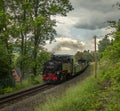 Steam engine train with passengers in summer day near Neudorf Germany 06 14 2023