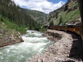 Steam engine train traveling from Durango to Silverton Colorado along the Animas river Royalty Free Stock Photo