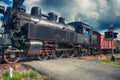 Steam engine on the trip Royalty Free Stock Photo