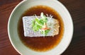 Steam fish in soy sauce.