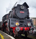 Steam locomotion manoovering on the train station