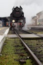 Steam locomotion manoovering on the train station