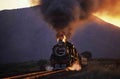 Steam locomotive with passenger carriage Royalty Free Stock Photo