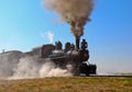 Steam locomotive train takes off.