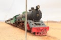 Steam locomotive and train wagons at Hejaz railway station near Wadi Rum, Jordan Royalty Free Stock Photo