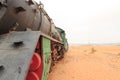 Steam locomotive and train wagons at Hejaz railway station near Wadi Rum, Jordan Royalty Free Stock Photo