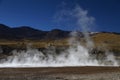 Steam with mountain landscape at El Tatio Chile Royalty Free Stock Photo