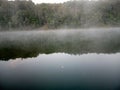 steam over the water on the lake