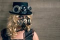 Steam point look represented by blond woman with hat and face mask Royalty Free Stock Photo