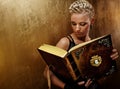 Steam punk girl with a book. Royalty Free Stock Photo