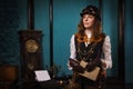 Steam punk girl with old book Royalty Free Stock Photo