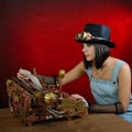 Steam punk girl with Typewriter. Royalty Free Stock Photo