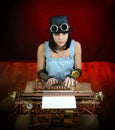 Steam punk girl with Typewriter. Royalty Free Stock Photo