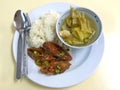 Steam rice with Fried fish, boiled vegetables