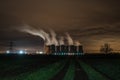 The Steam Rises From The Cooling Towers At Night