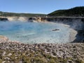 Steam rising from hot spring in crater Yellowstone National Park Royalty Free Stock Photo