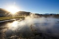 steam rising from a large geothermal hot spring Royalty Free Stock Photo